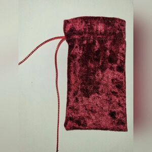 Burgundy pouch with red  drawstring